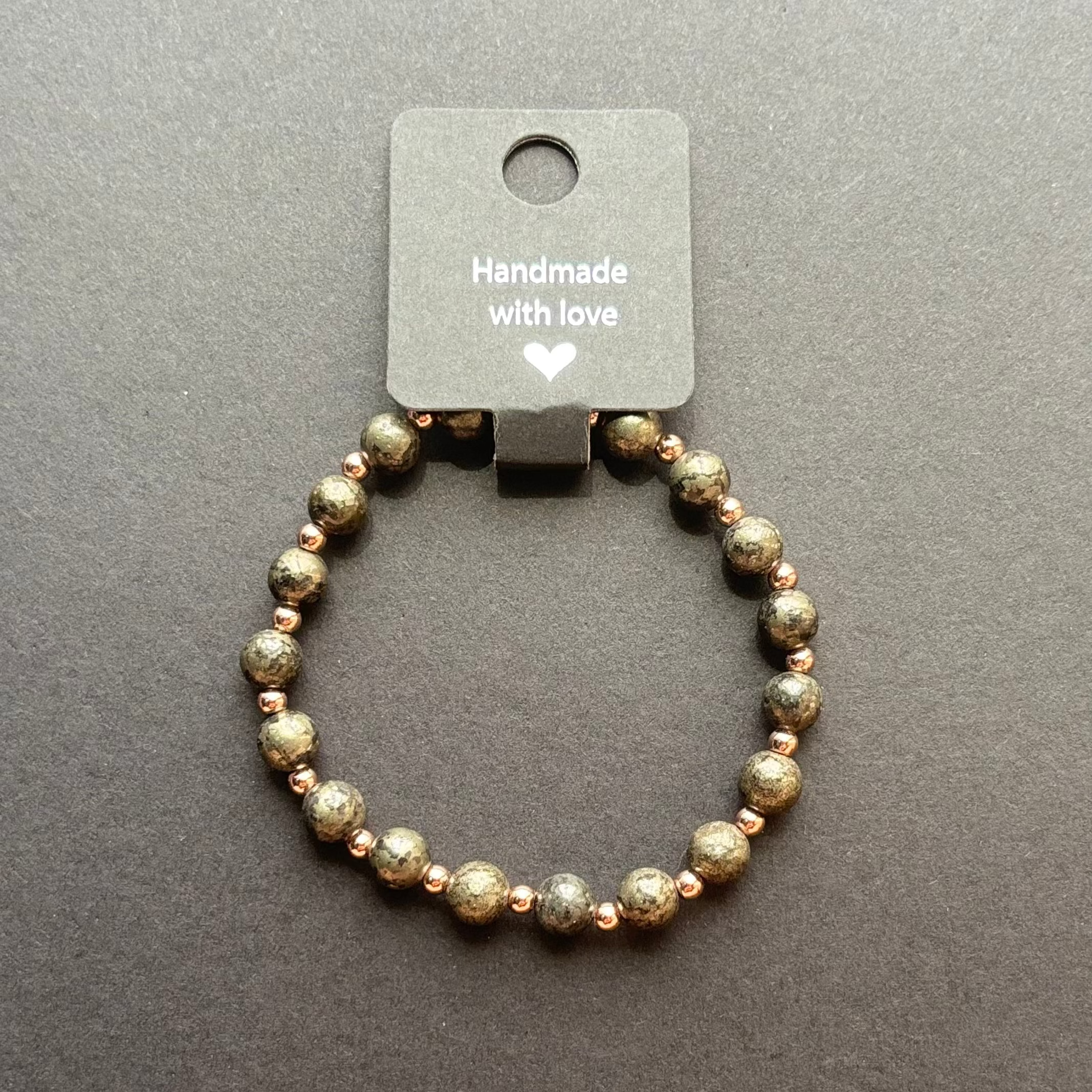 schwarz gold farbenes Armband von Mary Nightmare mit Rosé Perlen